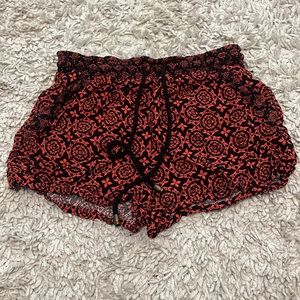 Orange/black shorts from rue21 with pockets size is girls L can fit size xs/s